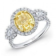 WHITE AND YELLOW GOLD FANCY YELLOW OVAL DIAMOND BRIDAL RING