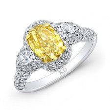 WHITE AND YELLOW GOLD FANCY YELLOW OVAL DIAMOND ENGAGEMENT RING